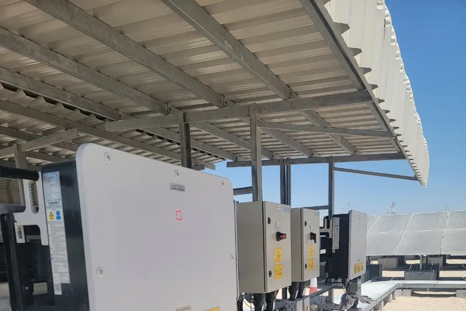 Inverter station at a hybrid plant